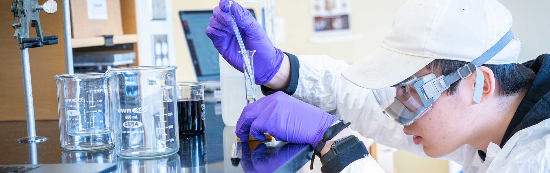 student in a science lab