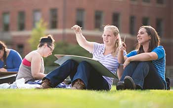 students drawing outside